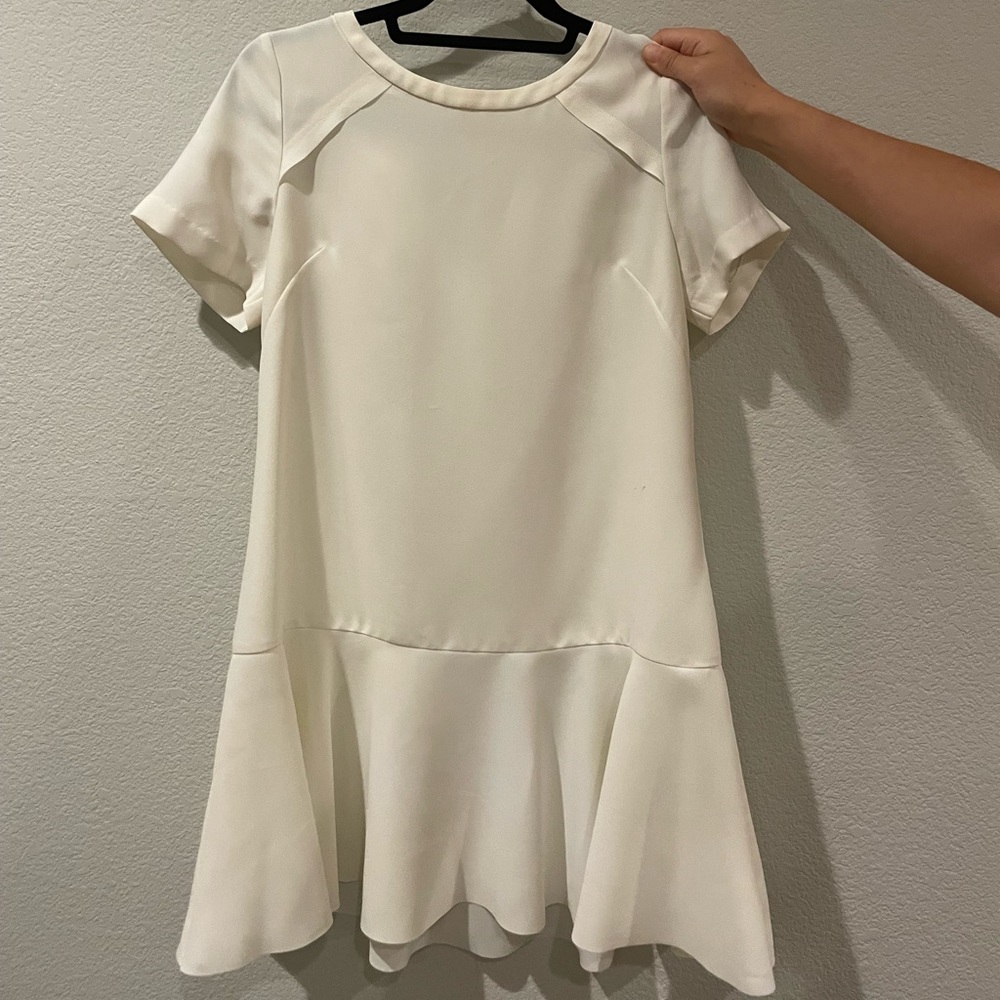 White dress with a little ruffle on the bottom from Banana Republic. Size S.